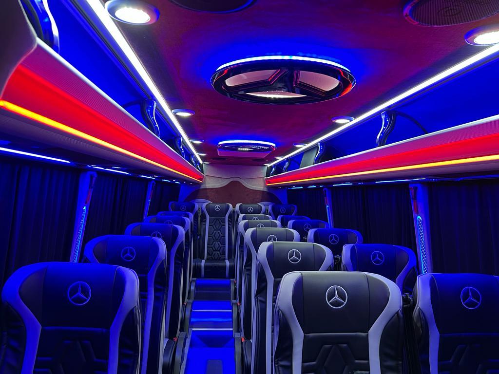 Sprinter interior and seating arrangement alweam passenger transport bus rental dubai.